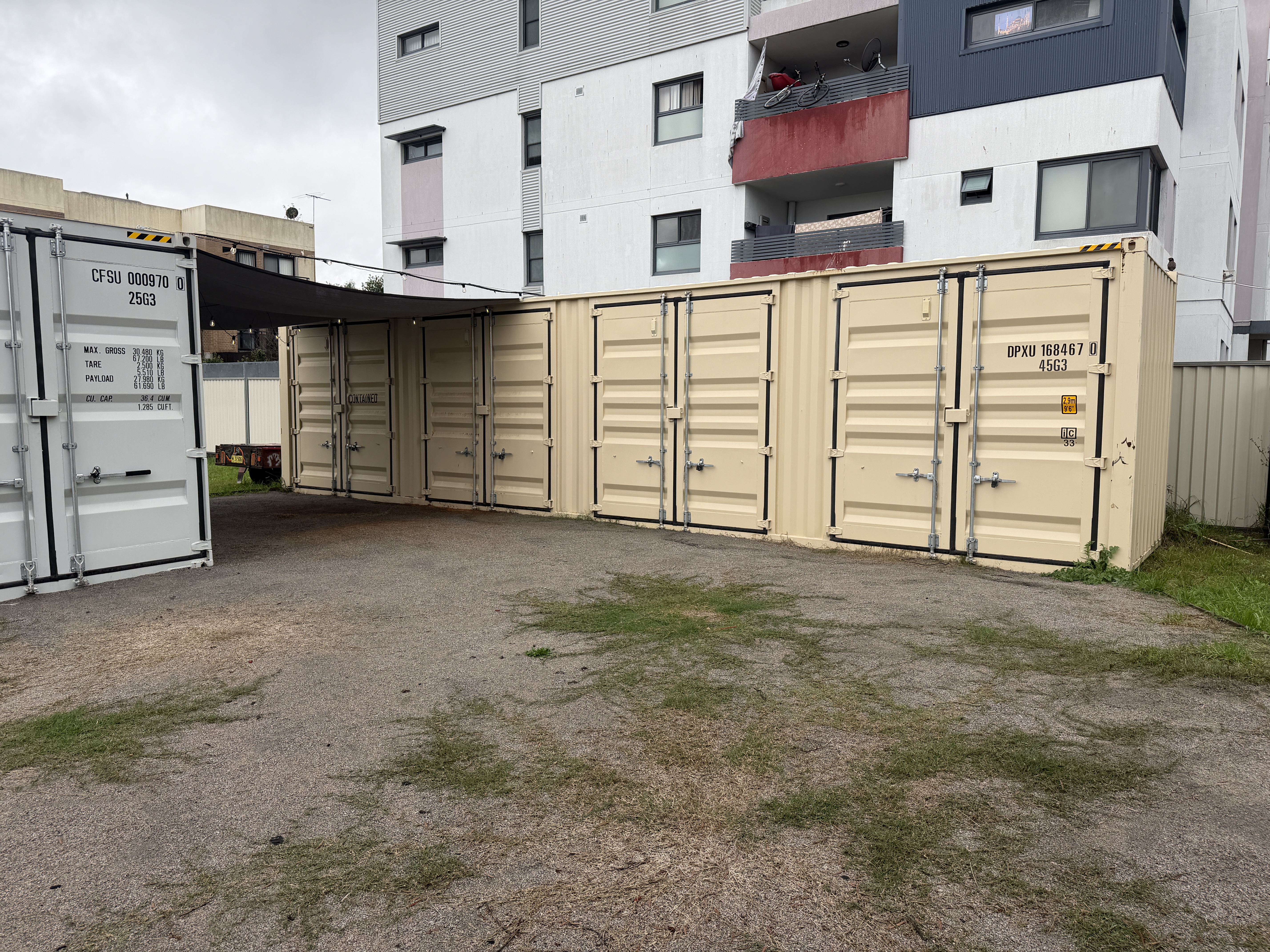 The CONTAINED container installed in a public community courtyard