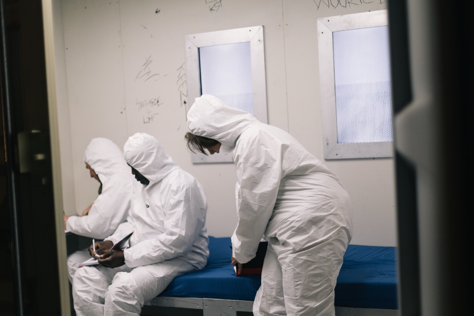 A group of visitors inside CONTAINED at night in Adelaide